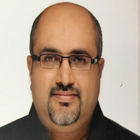 Dr. Manesh Chacko Philip